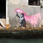 A mural by British street artist Banksy, of a child holding a pink flare, is pictured on August 27, 2019 on a building in Venice. (Photo by Vincenzo PINTO / AFP) / RESTRICTED TO EDITORIAL USE - MANDATORY MENTION OF THE ARTIST UPON PUBLICATION - TO ILLUSTRATE THE EVENT AS SPECIFIED IN THE CAPTION (Photo credit should read VINCENZO PINTO/AFP via Getty Images)